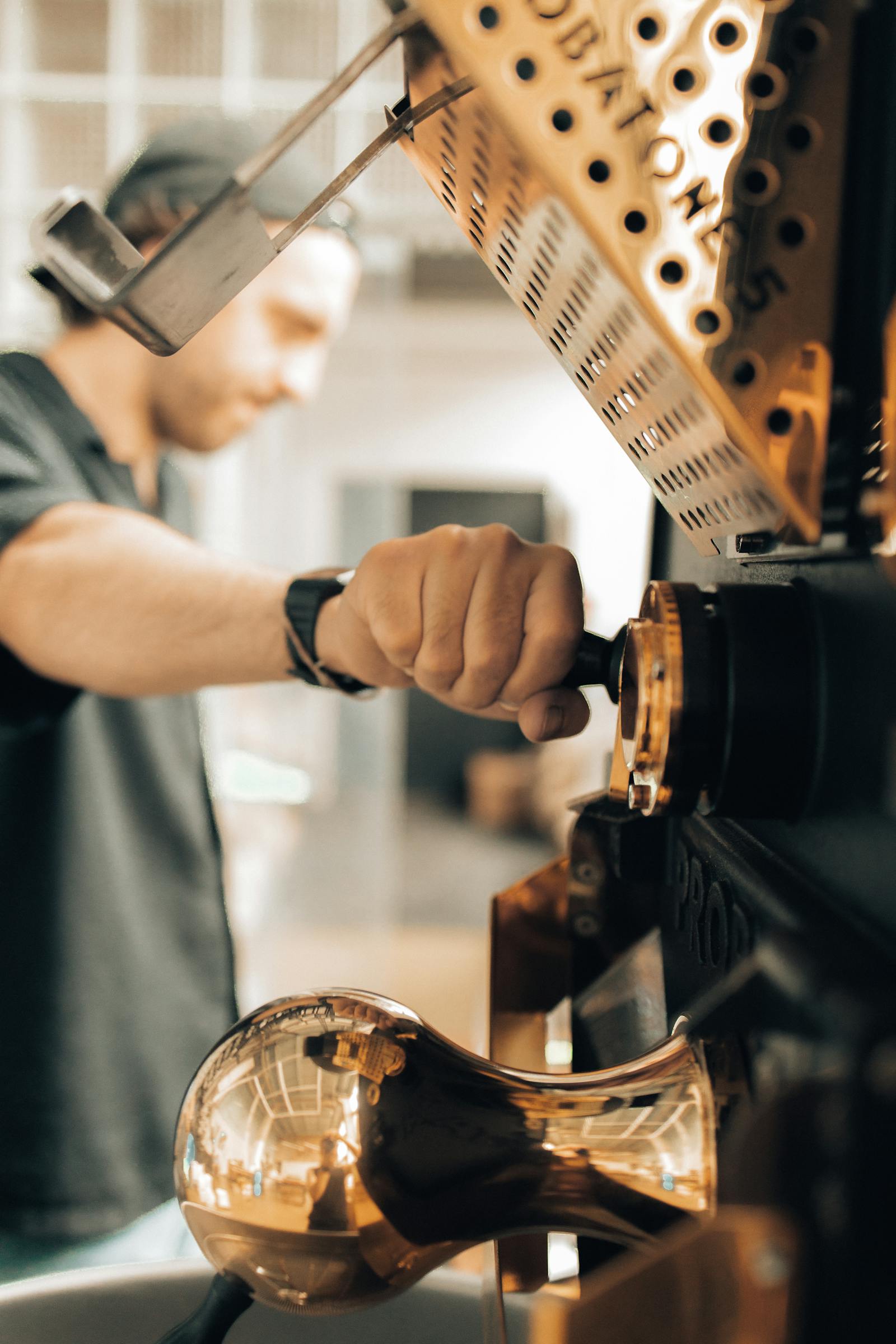 Coffee being roasted on a traditional roaster